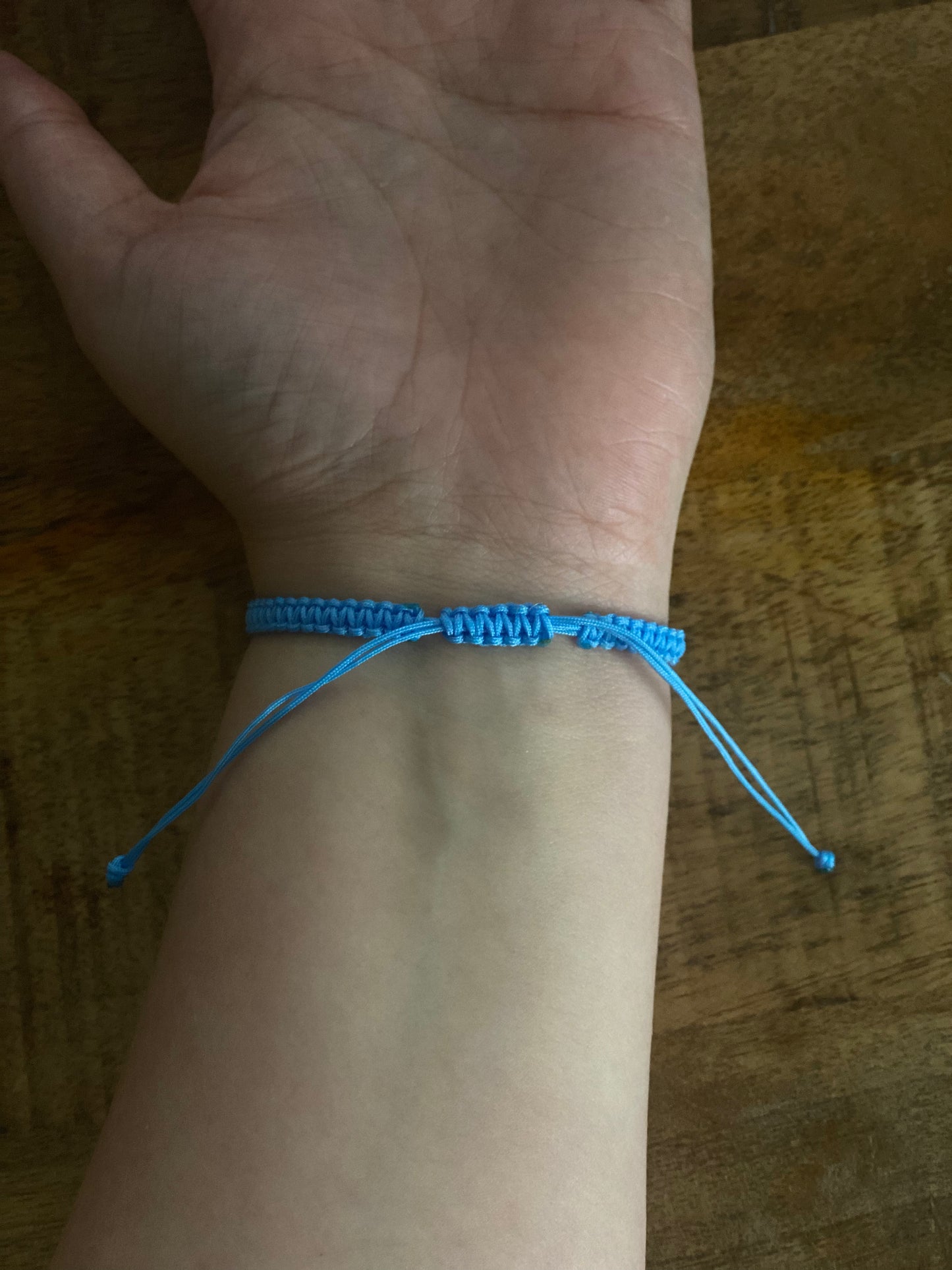 Geknoopt armbandje met infinity teken