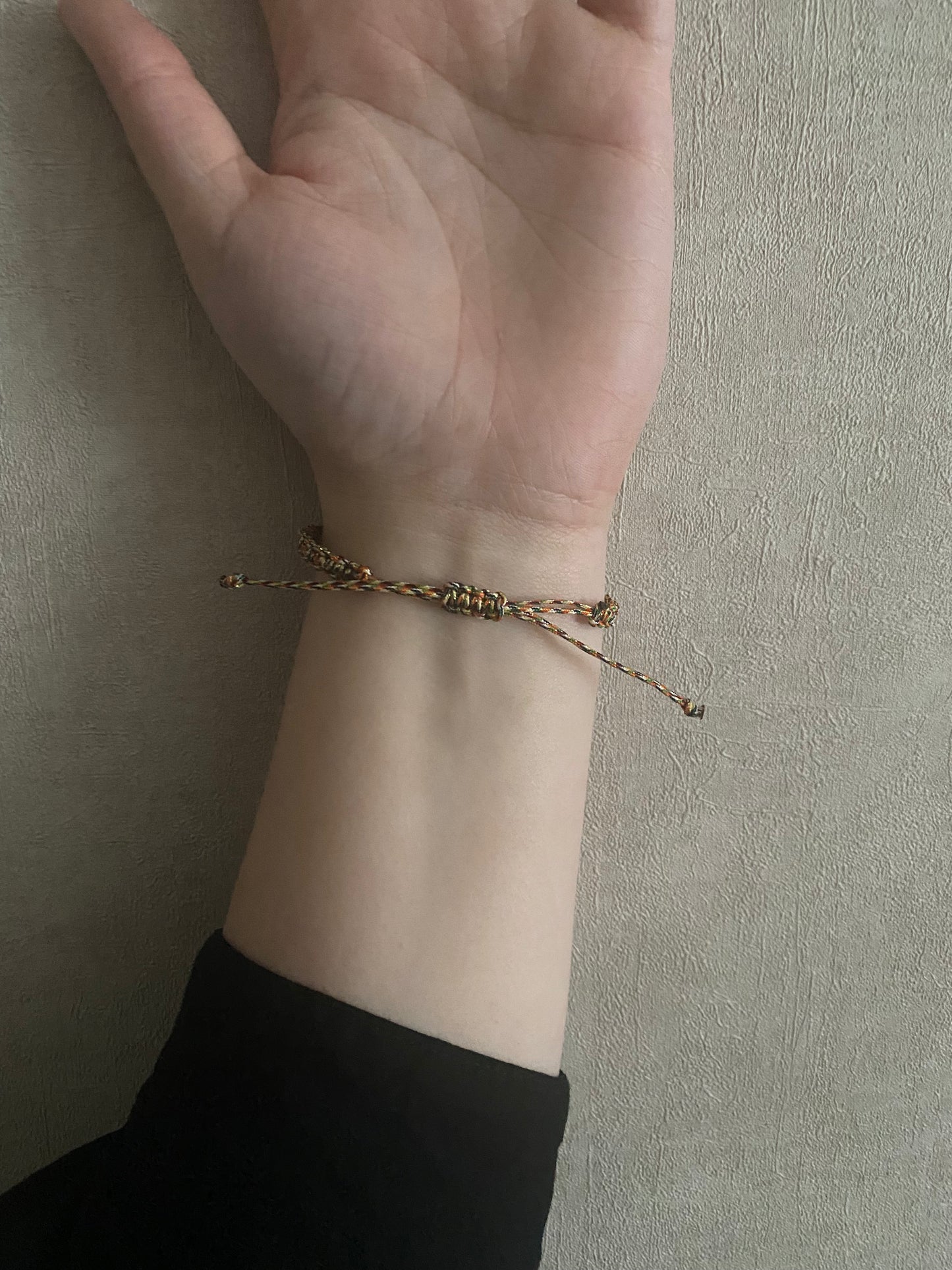 Geknoopt armbandje met luipaard schelp